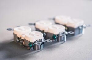 A detailed close-up of electrical outlets. Perfect for construction and electrical use themes.