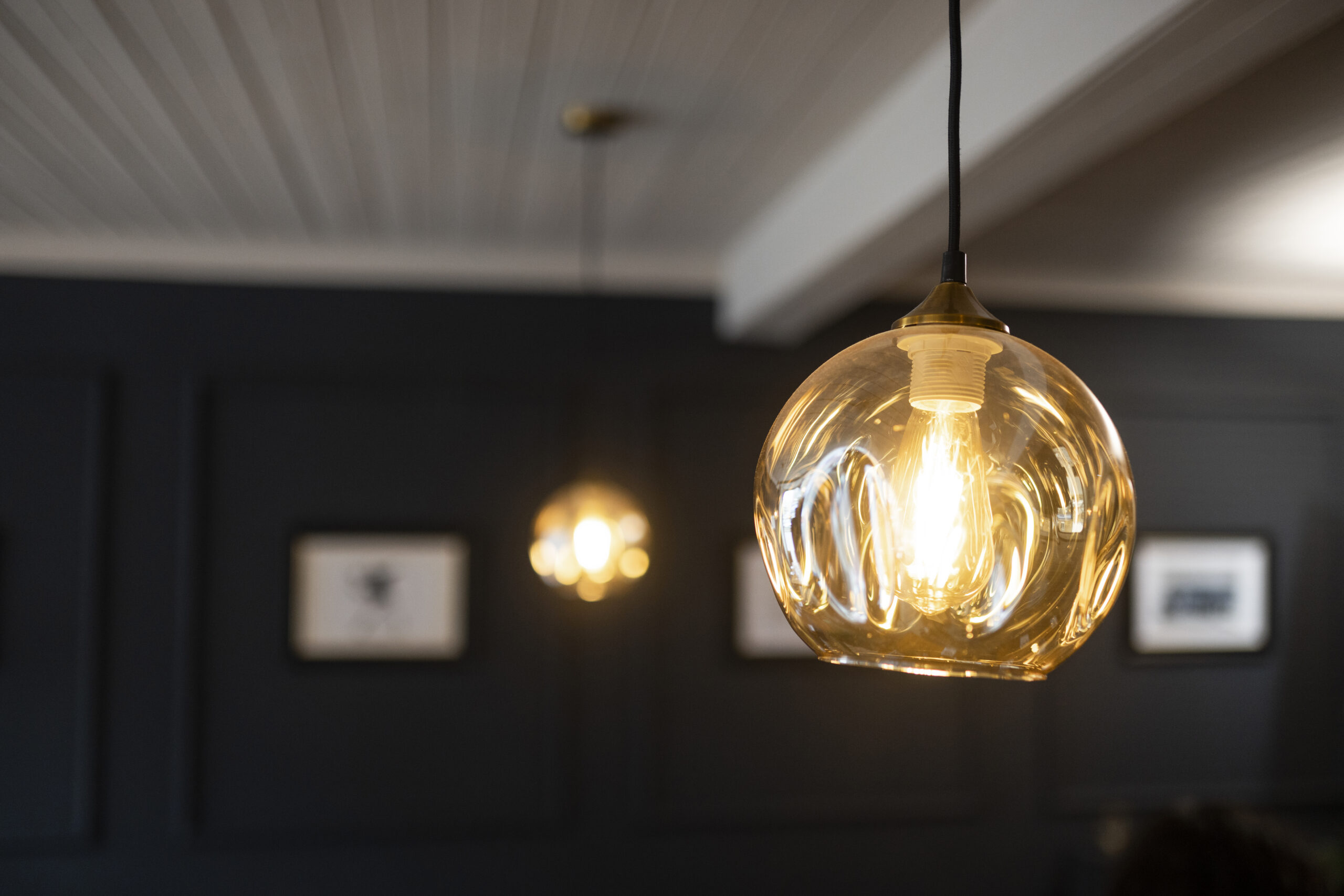 Two identical pendant lights side-by-side