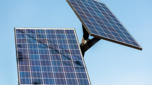 Renewable energy of solar panels. Solar panels on a background of blue sky.